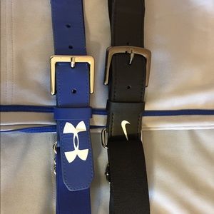 Two pair of boys baseball pants and two belts